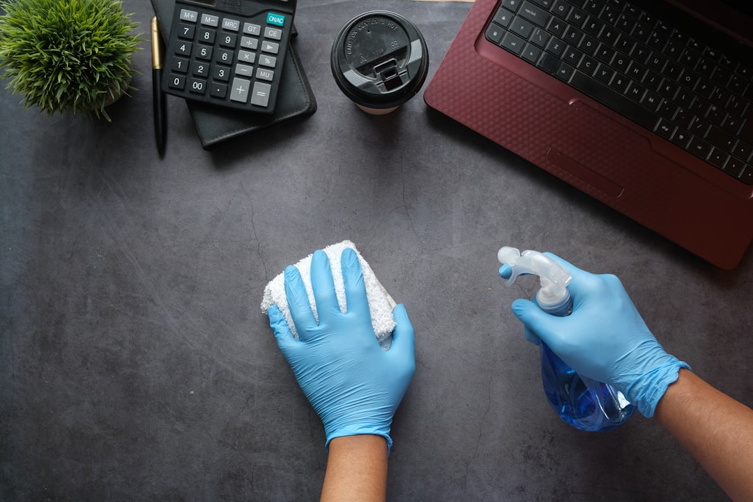 expertise-01 person-in-blue-long-sleeve-shirt-sitting-beside-black-laptop-computer-9gpkrsbgmc